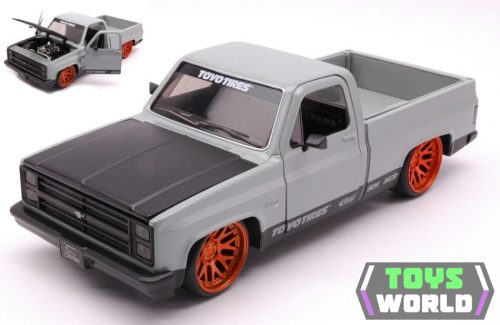 JADA - 1/24 - CHEVROLET - C-10 PICK-UP TOYO TIRES 1985 - MATT GREY BLACK